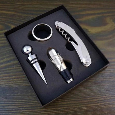 wijnaccessoireset met kurkentrekker, schenktuit, ring en stopper